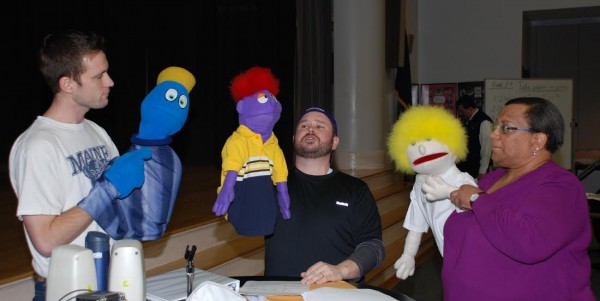 Nathan Roach (left), Matthew Madore (center)and Nancy Dymond (right) rehearse with puppets for a number from the hit-musical "Avenue Q." The three will perform this weekend in the Bangor Rotary Club's annual show, "Music Off Broadway." Nathan Roach (left), Matthew Madore (center)and Nancy Dymond (right) rehearse with puppets for a number from the hit-musical "Avenue Q." The three will perform this weekend in the Bangor Rotary Club's annual show, "Music Off Broadway."
