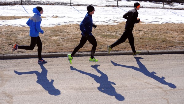 Ellworth High School long-distance runners Dan Curts (left) and Braydan Beardsley (right) train with Husson University graduate student Matt Homich in Ellsworth Monday. Ellworth High School long-distance runners Dan Curts (left) and Braydan Beardsley (right) train with Husson University graduate student Matt Homich in Ellsworth Monday.