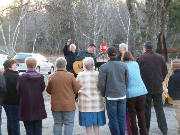 The Rev. Peter Remick points to the steeple of the East Bucksport United Methodist Church as the sun illuminates it during a sunrise Easter service outside the 158-year-old church that overlooks Route 46. The Rev. Peter Remick points to the steeple of the East Bucksport United Methodist Church as the sun illuminates it during a sunrise Easter service outside the 158-year-old church that overlooks Route 46.