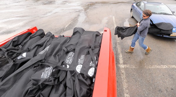 Lauren Jacobs, a community development coach in the central Maine area for the Maine Winter Sports Center, picks up cross-country skis at the Bangor Parks and Recreation building earlier this month. Jacobs picked up about 100 sets of skis, poles and boots in the Bangor region. The skis were on long-term lease to families in the area, but the organization provides about 1,000 sets statewide each year through its Healthy Hometowns program. Lauren Jacobs, a community development coach in the central Maine area for the Maine Winter Sports Center, picks up cross-country skis at the Bangor Parks and Recreation building earlier this month. Jacobs picked up about 100 sets of skis, poles and boots in the Bangor region. The skis were on long-term lease to families in the area, but the organization provides about 1,000 sets statewide each year through its Healthy Hometowns program.