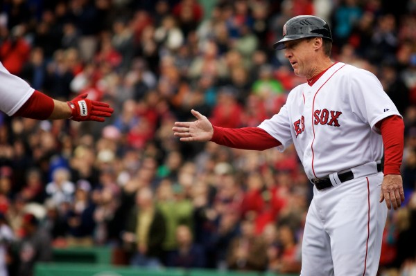 Maine native and current Standish resident Brian Butterfield congratulates David Ross as he rounds the bases after slugging the ball over the Green Monster at Fenway Park on April 13, 2013. Maine native and current Standish resident Brian Butterfield congratulates David Ross as he rounds the bases after slugging the ball over the Green Monster at Fenway Park on April 13, 2013.