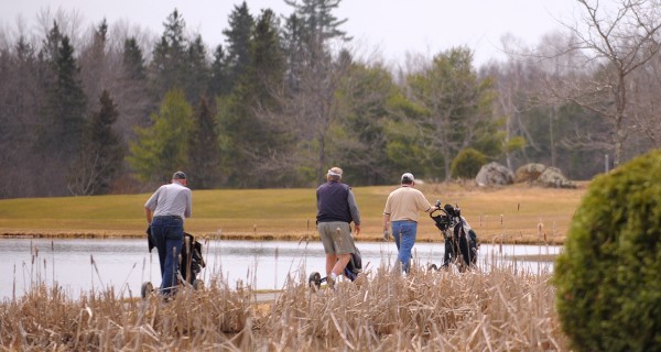People enjoy a round of golf at the Hermon Meadow Golf Club Tuesday morning. John Snyer, the owner of the club, said that the greens held up well during the winter and the ground is drying up surprisingly fast. People enjoy a round of golf at the Hermon Meadow Golf Club Tuesday morning. John Snyer, the owner of the club, said that the greens held up well during the winter and the ground is drying up surprisingly fast.