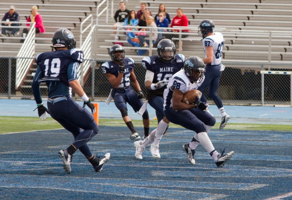 University of Maine senior Damarr Altman scores a touchdown during the annual Jeff Cole scrimmage at Morse Field, Saturday morning at the University of Maine. University of Maine senior Damarr Altman scores a touchdown during the annual Jeff Cole scrimmage at Morse Field, Saturday morning at the University of Maine.