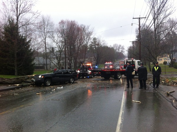 A tree fell on an SUV on Main Street in Orono Sunday afternoon, trapping a woman and her 2-year-old son inside. A tree fell on an SUV on Main Street in Orono Sunday afternoon, trapping a woman and her 2-year-old son inside.