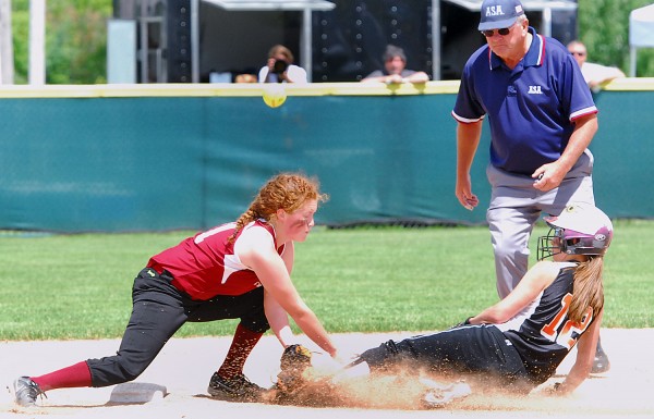 Limestone's Ellyzabeth Bencivenga steals second as the throw gets past Richmond High School's Kalah Patterson during the Class D State Championship at Coffin Field in Brewer Saturday. Limestone's Ellyzabeth Bencivenga steals second as the throw gets past Richmond High School's Kalah Patterson during the Class D State Championship at Coffin Field in Brewer Saturday.