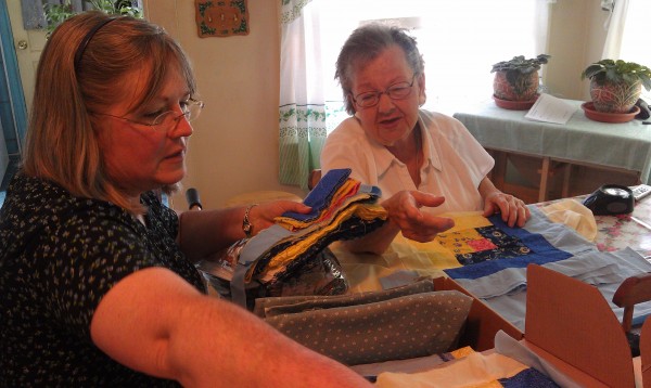 Dot MacDonald, 84, of Portland, examines quilt scraps with Karen McKenna, a vision rehabilitation therapist at the Iris Network, on June 17, 2014. McKenna has helped MacDonald adjust to vision loss. Dot MacDonald, 84, of Portland, examines quilt scraps with Karen McKenna, a vision rehabilitation therapist at the Iris Network, on June 17, 2014. McKenna has helped MacDonald adjust to vision loss.