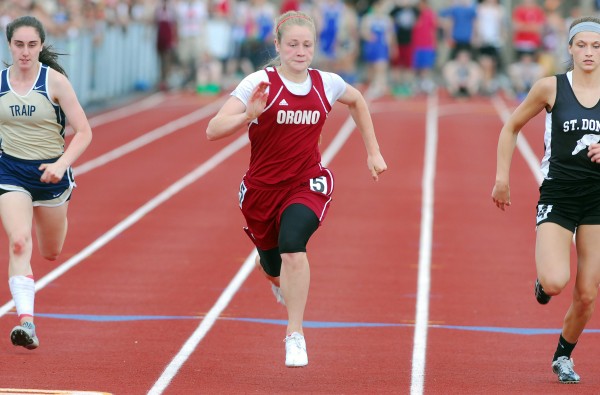 Orono's Lauren Stoops (center) finishes first in the 100-meter dash with a time of 12.88 seconds during the Class C state track and field championships Saturday at Foxcroft Academy. Stoops also won the 200 and finished third in the 400 to help Orono capture the state title. Orono's Lauren Stoops (center) finishes first in the 100-meter dash with a time of 12.88 seconds during the Class C state track and field championships Saturday at Foxcroft Academy. Stoops also won the 200 and finished third in the 400 to help Orono capture the state title.