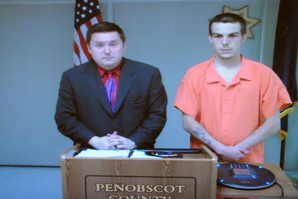 Anthony Bowie (right), 24, of Bangor appears via video at the Penobscot Judicial Center on Monday with attorney Jeremiah Haley. Anthony Bowie (right), 24, of Bangor appears via video at the Penobscot Judicial Center on Monday with attorney Jeremiah Haley.