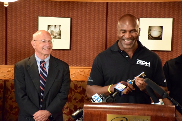 Portland Mayor Michael Brennan (left) presented five-time former heavyweight champion Evander Holyfield (right) a key to the city this afternoon. Holyfield will be a special guest at the All Star Boxing Event at the Portland Expo Center tomorrow night. Portland Mayor Michael Brennan (left) presented five-time former heavyweight champion Evander Holyfield (right) a key to the city this afternoon. Holyfield will be a special guest at the All Star Boxing Event at the Portland Expo Center tomorrow night.