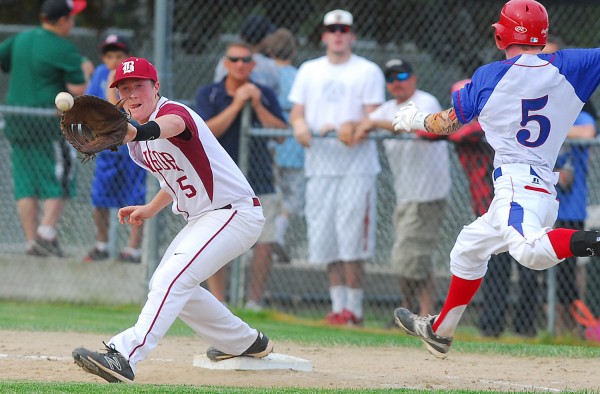 Bangor High School first baseman Andrew Hillier fields a throw to force out Messalonskee's Trevor Gettig during fifth-inning action of the Eastern Maine Class A final Tuesday at Morton Field in Augusta. Bangor High School first baseman Andrew Hillier fields a throw to force out Messalonskee's Trevor Gettig during fifth-inning action of the Eastern Maine Class A final Tuesday at Morton Field in Augusta.