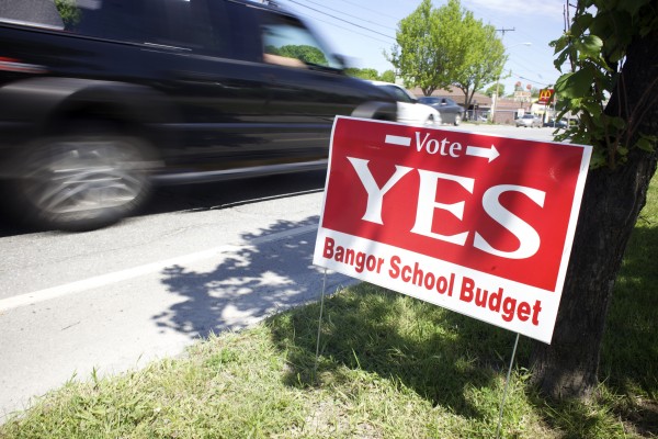 A sign paid for by the Bangor Education Association encourages voters to vote in favor of the Bangor school budget. A sign paid for by the Bangor Education Association encourages voters to vote in favor of the Bangor school budget.