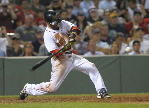 Boston's Dustin Pedroia (15) singles during the eighth inning against the Minnesota Twins at Fenway Park in Boston Tuesday night. Boston's Dustin Pedroia (15) singles during the eighth inning against the Minnesota Twins at Fenway Park in Boston Tuesday night.