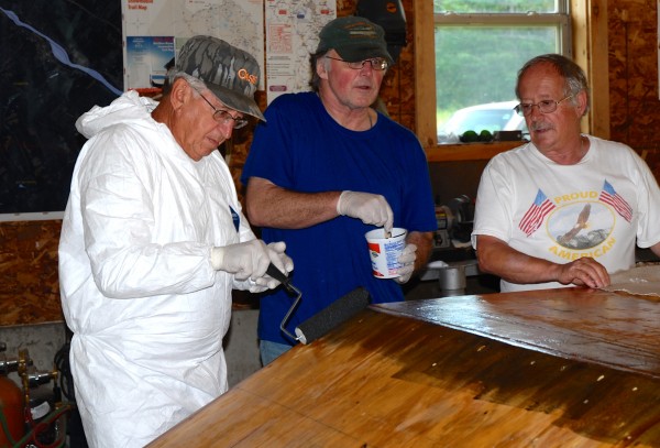 Boat builders Patrick Ayotte Jr. (left), Dave Wylie (center) and Gerald Soucy discuss the final plans for the Acadian Queen, a historical replica of a St. John River ferry boat. Boat builders Patrick Ayotte Jr. (left), Dave Wylie (center) and Gerald Soucy discuss the final plans for the Acadian Queen, a historical replica of a St. John River ferry boat.