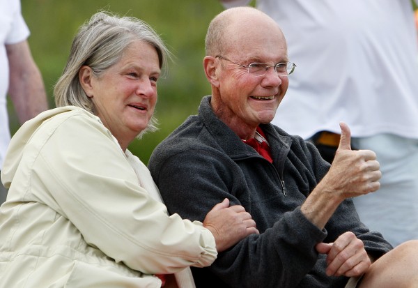 Don Winslow (right) gives the thumbs-up in support of the flash mob unfolding in front of him and Dora Winslow on Tuesday, June 17, at the Bangor Waterfront. Don Winslow (right) gives the thumbs-up in support of the flash mob unfolding in front of him and Dora Winslow on Tuesday, June 17, at the Bangor Waterfront.