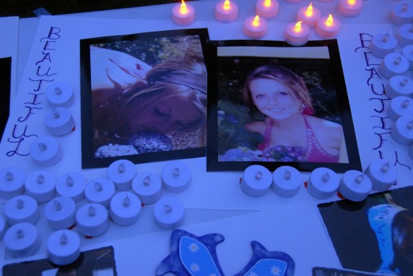 Electric vigil candles and mementos adorn a table at a vigil for missing Maine native Danielle Bertolini at Cascade Park on Saturday, July 19, 2014. Electric vigil candles and mementos adorn a table at a vigil for missing Maine native Danielle Bertolini at Cascade Park on Saturday, July 19, 2014.