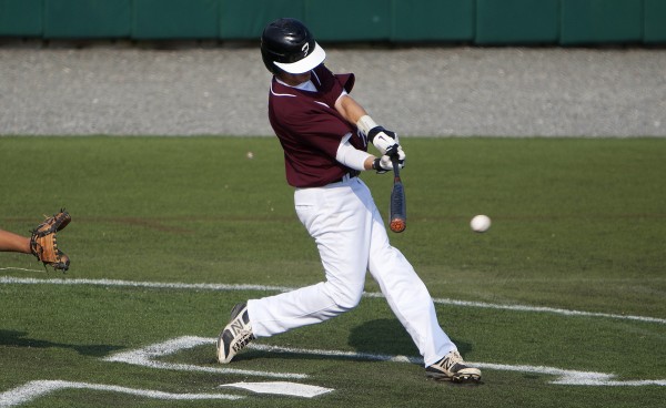 Brewer's Logan Rogerson connects on a pitch from Trenton during a Zone 1 American Legion playoff game Wednesday at Husson University. Brewer's Logan Rogerson connects on a pitch from Trenton during a Zone 1 American Legion playoff game Wednesday at Husson University.