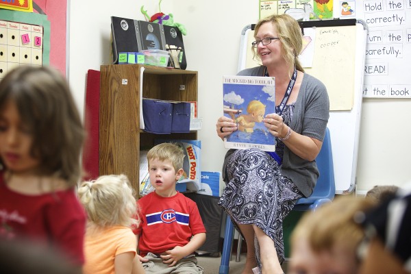 Kelley Watson, a preschool teacher at Penquis Head Start in Bangor reads a book to children in her class. Penquis has several ways of preparing children for kindergarten in Maine. Kelley Watson, a preschool teacher at Penquis Head Start in Bangor reads a book to children in her class. Penquis has several ways of preparing children for kindergarten in Maine.