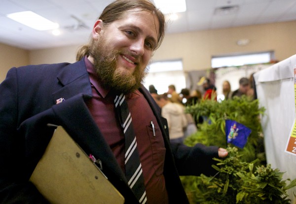 Paul McCarrier of Medical Marijuana Caregivers shows a cannabis plant at the Home Grown Maine Medical Marijuana Trade Show, a conference designed to teach individuals how to grow medical marijuana Saturday in Bangor. Paul McCarrier of Medical Marijuana Caregivers shows a cannabis plant at the Home Grown Maine Medical Marijuana Trade Show, a conference designed to teach individuals how to grow medical marijuana Saturday in Bangor.