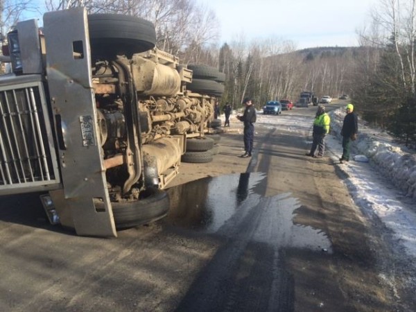 truck driver summoned for violations after log truck accident in log truck driver