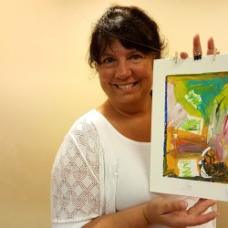 Nurses like Michelle Markie, who have received Sexual Assault Forensic Examiner certification, are trained to record sexual assault victims' histories and collect evidence to help in the prosecution of their abusers. Markie, who works at St. Joseph Hospital in Bangor, estimated she personally encounters two to three cases of sex trafficking in her unit per year. She is pictured at a recent art auction to raise money for Hope Rising, a residential treatment program for survivors of the crime of human trafficking.