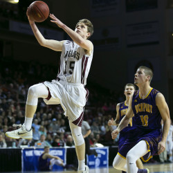 George Stevens Academy’s Taylor Schildroth (left) floats to basket past Bucksport’s Hayden Craig during their Class C North boys championship game at the Cross Insurance Center in Bangor last season. Schildroth is a top player to watch for the upcoming season.
