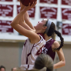 Bangor’s Katie Butler goes up for two against Edward Little during a game at Red Barry Gym in Bangor last season. Butler, who is a senior this season, was the team’s leading scorer and rebounder last year.
