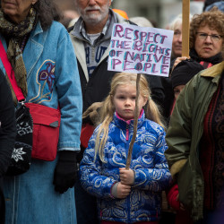 Eva Beal, 8, of Ellsworth participated a Dakota Access Pipeline protest in West Market Square in Bangor in November. Social justice organizations in Maine are offering “bystander intervention” trainings to deflects and de-escalate harassment and violence against protesters and others.