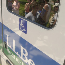 The L.L. Bean logo is visible on the back of an Island Explorer bus in this 2002 file photo. New rules adopted by the National Park Service last month have raised concerns that there could be increased visibility of corporate donors at national parks nationwide.