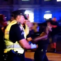 A protester is led away by police during a Black Lives Matter protest in Portland in this July 2016 file photo.