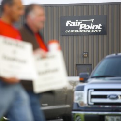 FairPoint employees conduct an informational picket in Bangor in this August 2014 file photo.