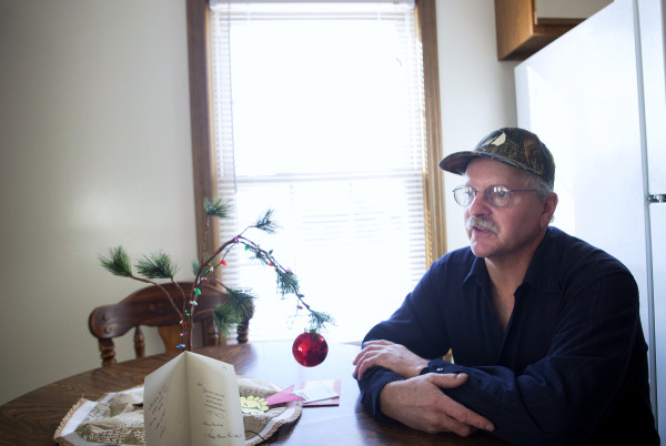Tom Picard sits in his home in Millinocket Saturday. Picard says he lives "the new normal." As a millworker, Tom has been laid off 10 times since 1980. For the last few years he has been making the weekly commute to his new job 130 miles away, at the Huhtamaki plant in Waterville. This past summer, he divorced his wife, Tammy Shorey Picard, as the commuting was putting a strain on their relationship. Tom Picard sits in his home in Millinocket Saturday. Picard says he lives "the new normal." As a millworker, Tom has been laid off 10 times since 1980. For the last few years he has been making the weekly commute to his new job 130 miles away, at the Huhtamaki plant in Waterville. This past summer, he divorced his wife, Tammy Shorey Picard, as the commuting was putting a strain on their relationship.