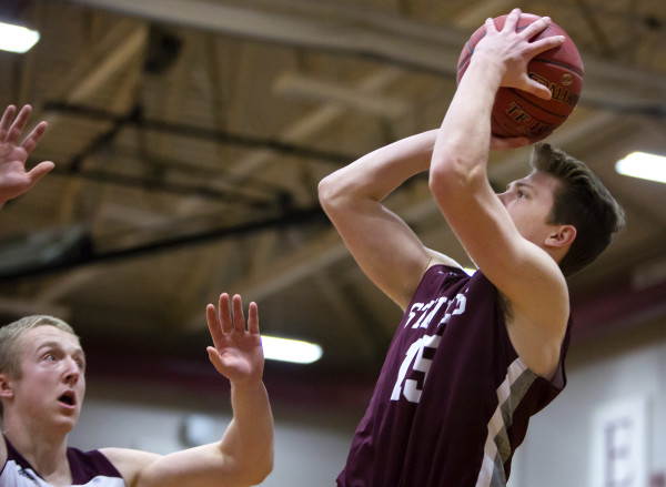 George Stevens Academy's Taylor Schildroth (right) fades a shot past Ellsworth's Trent Mahon during their basketball game in Ellsworth in this December 2016 file photo. Schildroth scored 61 points a recent game against Lee Academy. George Stevens Academy's Taylor Schildroth (right) fades a shot past Ellsworth's Trent Mahon during their basketball game in Ellsworth in this December 2016 file photo. Schildroth scored 61 points a recent game against Lee Academy.