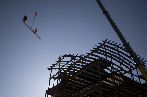 The final structural beam is lifted into place during a topping-off ceremony at the Jackson Laboratory in Bar Harbor Monday afternoon. The new Center for Biometric Analysis research facility at is expected to be complete in January 2018. The final structural beam is lifted into place during a topping-off ceremony at the Jackson Laboratory in Bar Harbor Monday afternoon. The new Center for Biometric Analysis research facility at is expected to be complete in January 2018.
