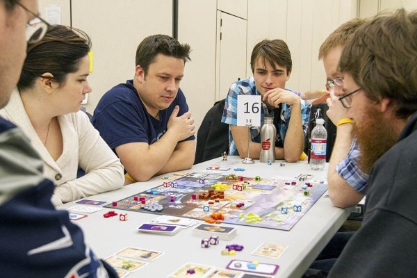 Jillian Piehler (from left), Keith Piehler and Joey Leask play the board game Euphoria with others during a SnowCon Gaming Convention. Jillian Piehler (from left), Keith Piehler and Joey Leask play the board game Euphoria with others during a SnowCon Gaming Convention.