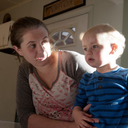 Kayla Doherty, 23, with her 17-month-old son Blake Doherty at her mother's Pittsfield home. 
