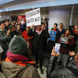 People gather to protest against the travel ban imposed by U.S. President Donald Trump's executive order at O'Hare airport in Chicago, Illinois, U.S. January 28, 2017. 
