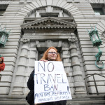 Beth Kohn protests against U.S. President Donald Trump's executive order travel ban, outside the 9th U.S. Circuit Court of Appeals courthouse in San Francisco, California, Feb. 7, 2017.