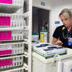 Angela Young gets supplies to treat a patient at Eastern Maine Medical Center in Bangor in this May 2016 file photo.