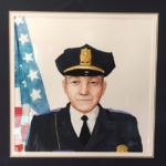 A portrait of former Bath Police Sgt. Merle Niles, painted by local artist Benjamin Glick.  