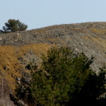 One of the waste rock piles at the former Callahan Mine Corp. site in Brooksville. The company operated at the site from 1968-1972 and studies have determined that contaminants leaching from the piles have been moving into nearby waters.