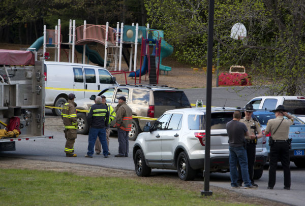 Emergency responders work to reconstruct the scene where a 1-year-old boy was fatally hit by a vehicle at Alton Elementary School Friday. Emergency responders work to reconstruct the scene where a 1-year-old boy was fatally hit by a vehicle at Alton Elementary School Friday.