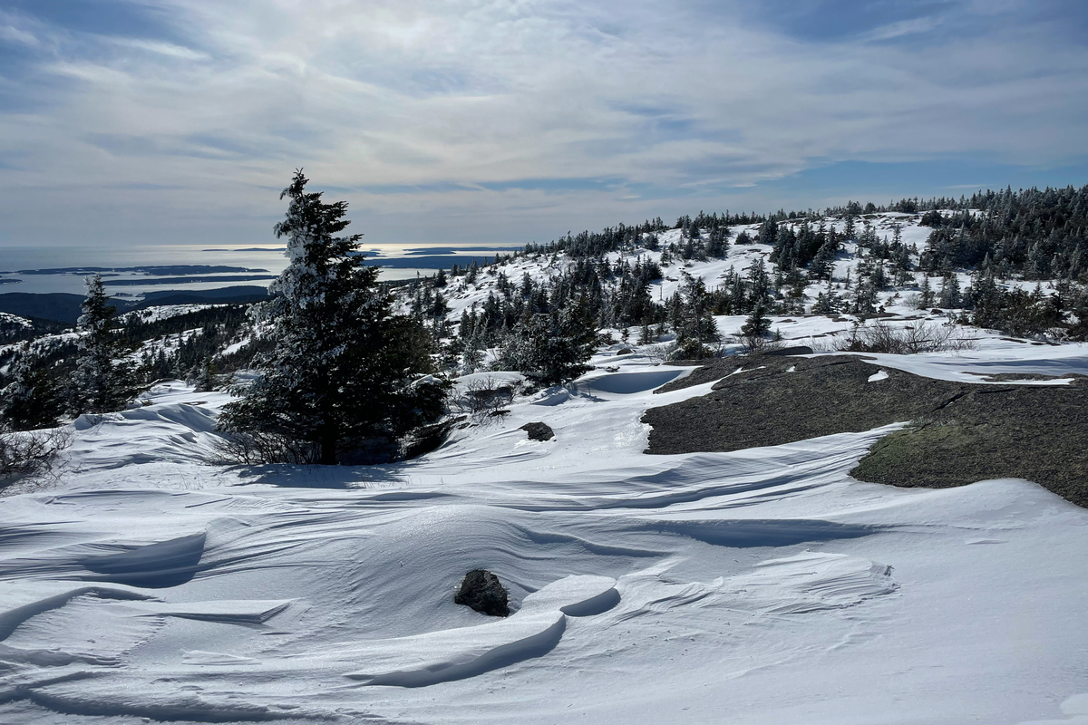 A snowy hike up Acadia’s Cadillac Mountain offers peaceful solitude