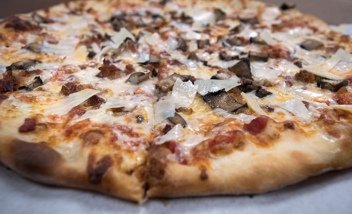 What is a ‘Bangorstyle’ pizza? And why does it have peanuts on it?