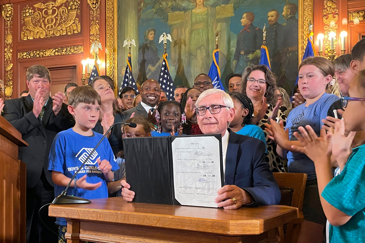 Wisconsin governor signs budget with 400year school funding increase