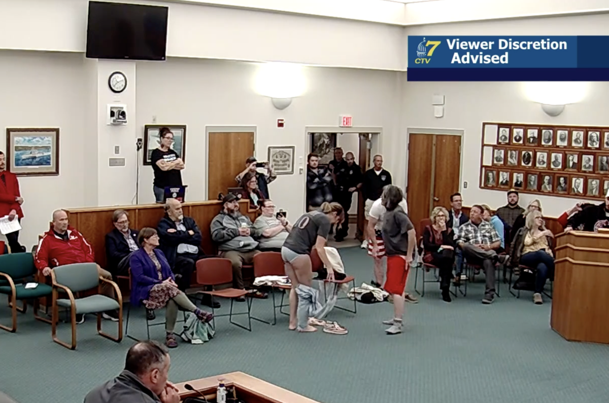 Protesters strip at Augusta school board meeting over Title IX policy