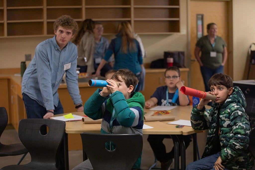 UMF pre-service teachers welcome students from five Maine island schools for hands-on learning