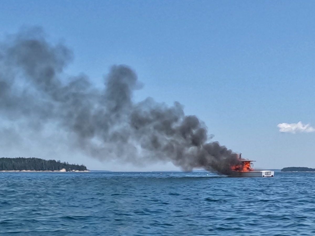 Maine lobsterman rescued by kayaker after leaping from burning fishing boat